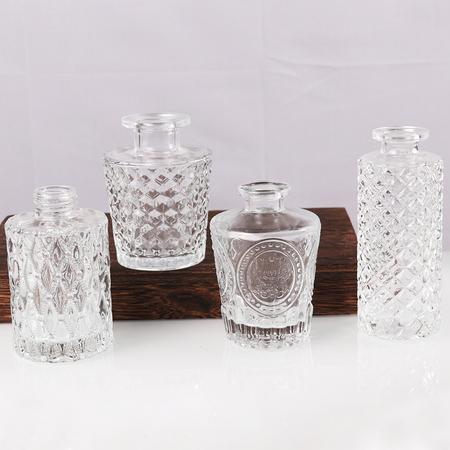 Round and square patterned glass diffuser bottles